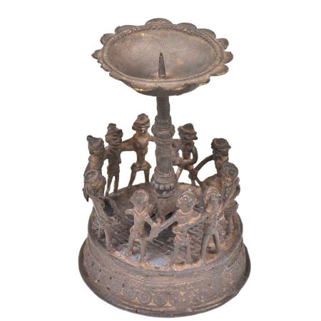 Brass Tribal Folk Dance around A Tall Candleholder
