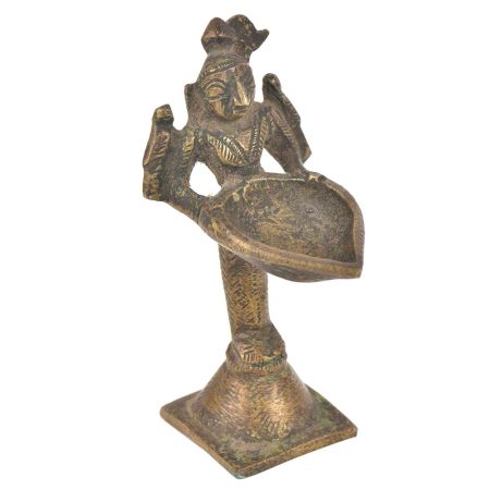 Brass Lady Holding A Diya In Her Hand On A Raised Platform