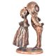 Figurines of a Girl  kissing a Boy