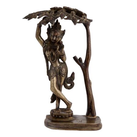 Brass Goddess Statue Under A Tree