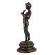 Brass Statue Of Boy Playing Flute