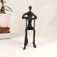 Vintage Finish Brass Statue of Musician for Collection and Decor