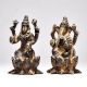 Lord Ganesha and Goddess Lakshmi Sitting on Lotus Flower Figurine